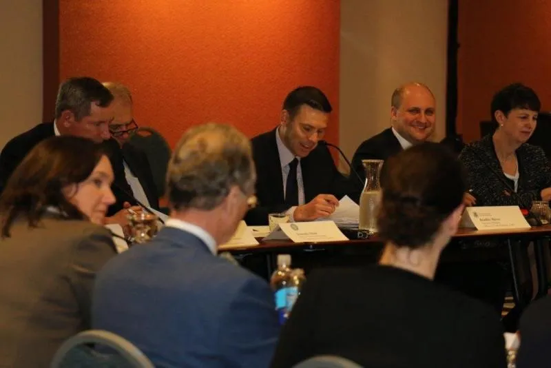 CBP Acting Commissioner Kevin McAleenan (center, holding a paper) participates in the CBP-sponsored quarterly COAC meeting, Feb. 28. Photo by Keith Smith