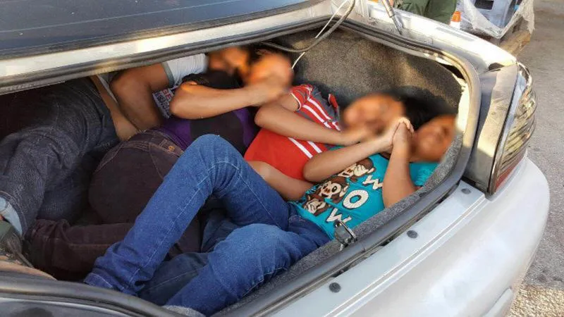 Migrants in a trunk