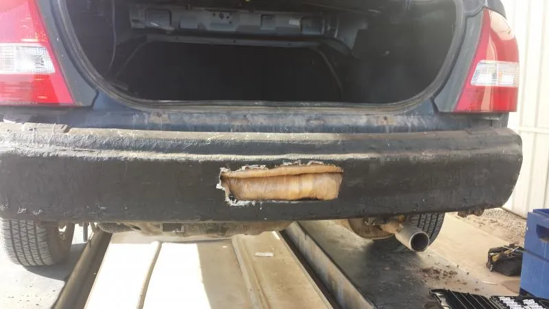 U.S. Border Patrol agents found 19 packages of methamphetamine, heroin, and cocaine hidden in the front and rear bumpers of this vehicle.