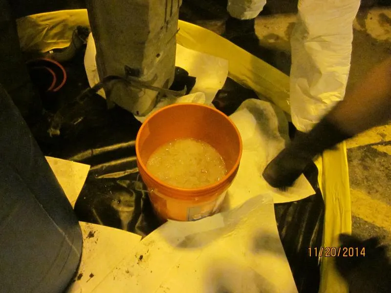 Bucket containing liquid methamphetamine, part of an 112-pounds meth load valued at $3.5 million seized by Border Patrol agents at Falfurrias checkpoint