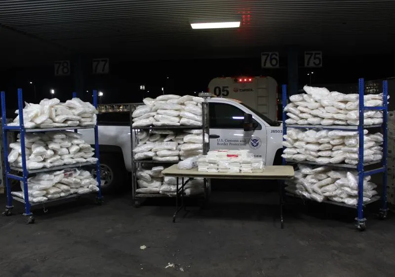 Packages containing 2,611 pounds of methamphetamine, 113 pounds of cocaine seized by CBP officers within a tractor trailer at World Trade Bridge