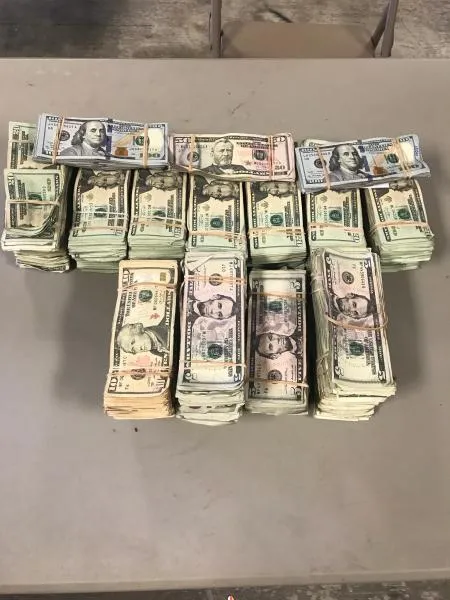 Packages containing $90,367 in unreported currency seized by CBP officers at Laredo Port of Entry