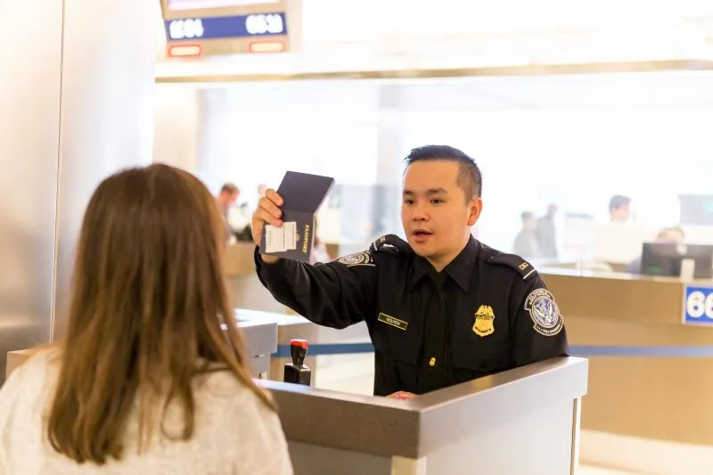 CBP officer conducting passenger processing functions at LAX