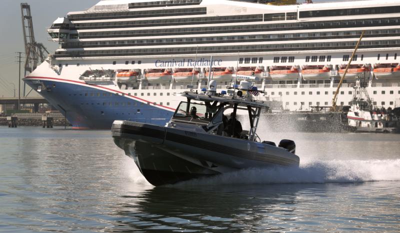 An AMO boat patrols the Port of Long Beach, California.