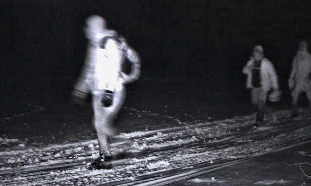Three adults attempting to cross the border illegally. Picture is in black and white due to night vision camera and grainy. 