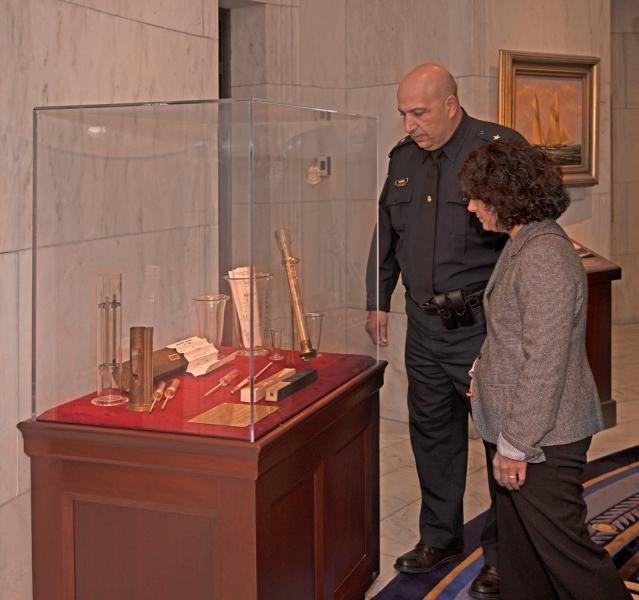 CBP Boston Director of Field Operations William A. Ferrara views one of the new displays at the Historic Boston Custom House.