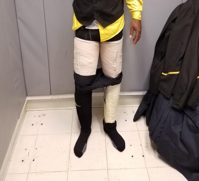 Crewmember is caught with cocaine tapped to his legs at JFK.