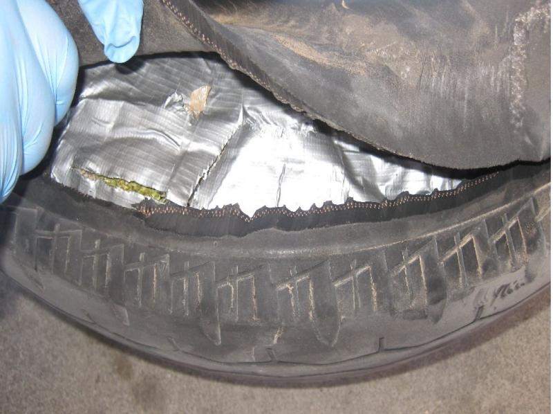 CBP officers at the Andrade port of entry found marijuana concealed in this spare tire