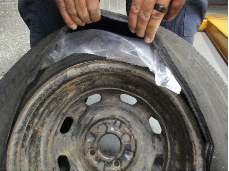 CBP officers at the San Ysidro port of entry discovered 37 wrapped packages of methamphetamine concealed in the spare tire, quarter panels and seats of a Honda Civic.