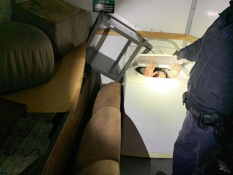 CBP freed some of the Chinese nationals from a washing machine, chest and a dresser. 