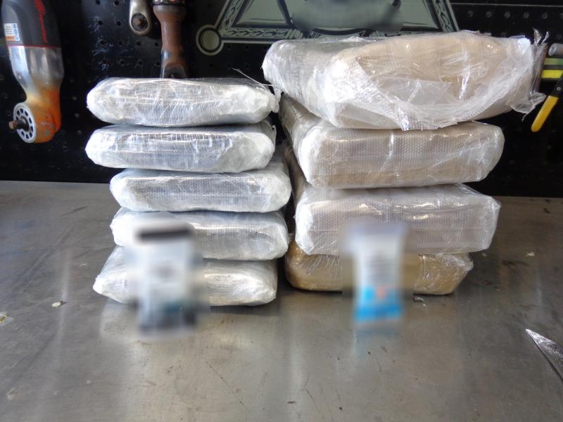 U.S. Border Patrol agents arrested a woman on Thursday afternoon who was transporting more than 21 pounds of heroin and cocaine in her vehicle.