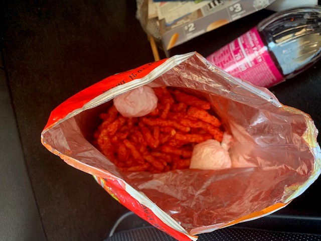 While in secondary inspection, Border Patrol agents discovered two small bags concealed inside a resealed bag of snacks.