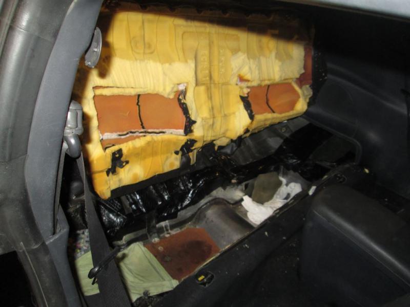 U.S. Customs and Border Protection officers working at the Calexico downtown port of entry found a man concealed inside the rear seat of a car.