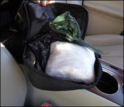 Two bundles of methamphetamine were found inside the console.