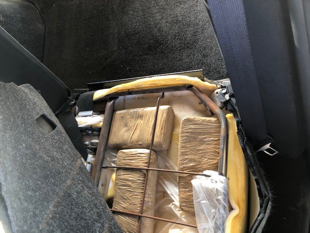 Agents found almost 7 lbs. of heroin in car.