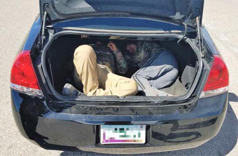 Agents discovered two illegal aliens inside the trunk of a smuggling vehicle