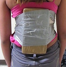 A 12-year-old girl was found to have 2 pounds of cocaine wrapped around her torso 