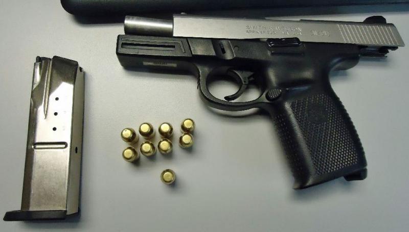 Officers seized a loaded weapon from a smuggler attempting to flee into Mexico through the port