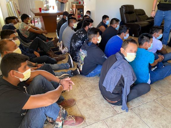 Agents discoverd more than 20 illegal aliens inside of a stash house