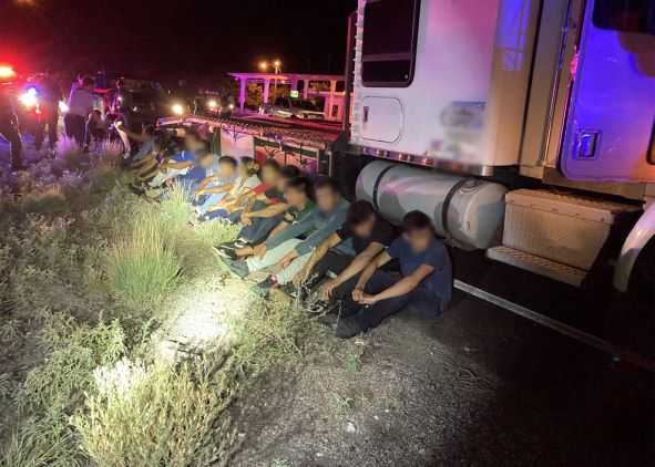 Agents arrested two teens who were attempting to smuggle nearly 2 dozen illegal aliens 