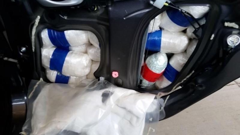 Officers removed heroin, fentanyl and meth from throughout a smuggling vehicle