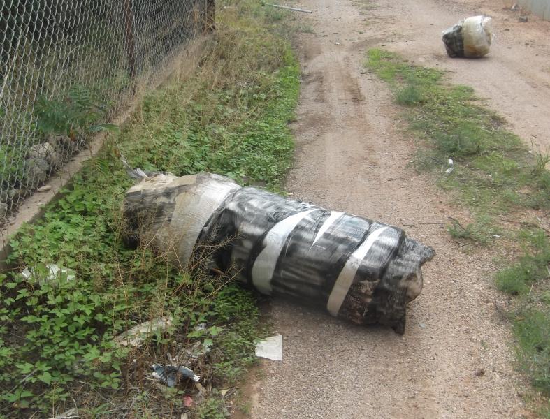 Agents seized the large bundle of marijuana which was found near the fence in Douglas, Ariz. 