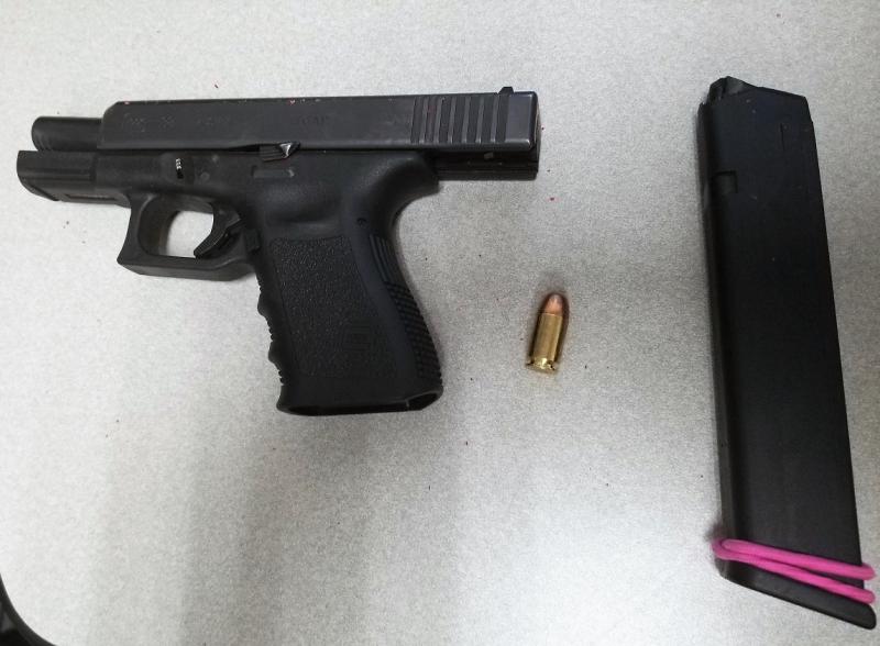 Agents seized a loaded handgun and a small amount of meth from the driver of a smuggling vehicle