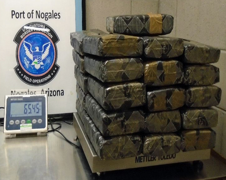 More than 65 pounds of marijuana were recovered from within the gas tank of a smuggling vehicle, by officers at the Nogales West Mariposa crossing.