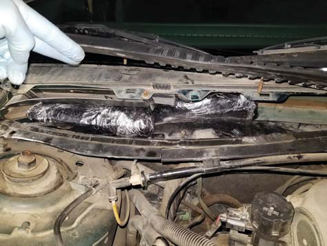 Agents discovered 44 pounds of meth within the window well of a smuggling vehicle