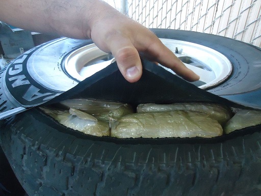 Drug smugglers attempted to hide marijuana packages inside of the tires of a smuggling vehicle 