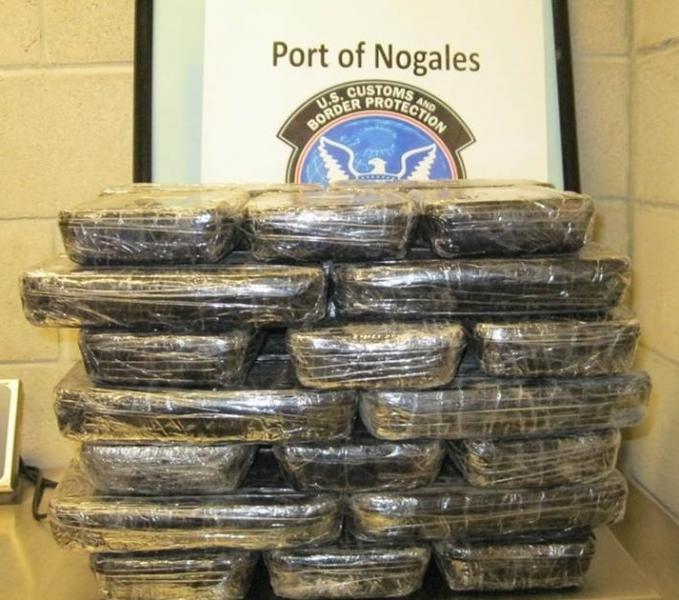 Officers seized 49 pounds of meth from a smuggling vehicle