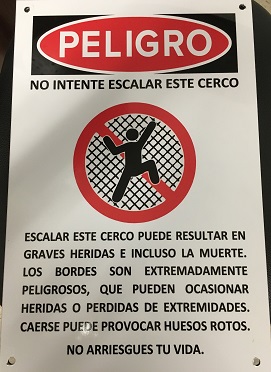 CBP Fence Signs Posted in English/Spanish