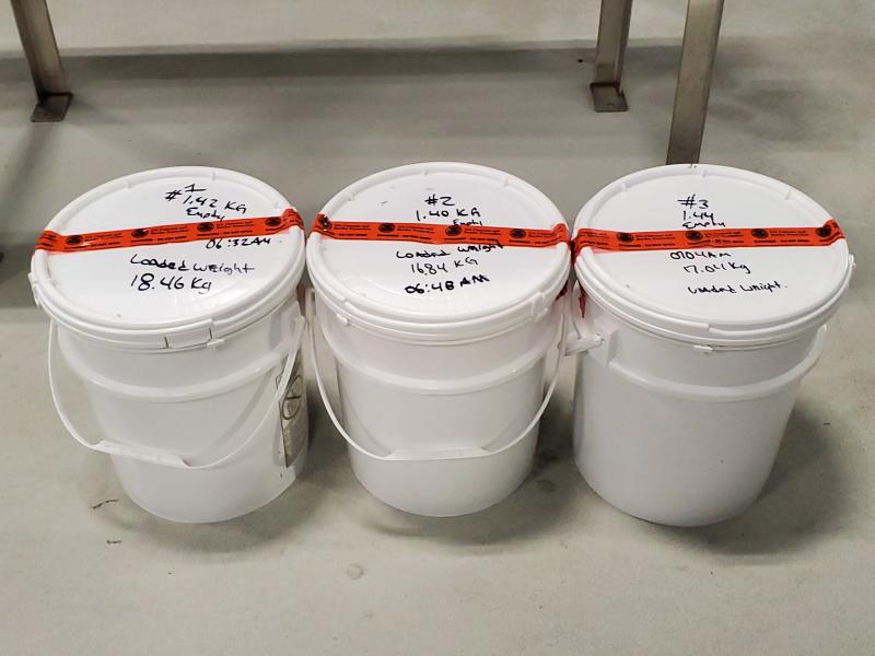 Buckets containing 115 pounds of methamphetamine seized by CBP officers at Laredo Port of Entry