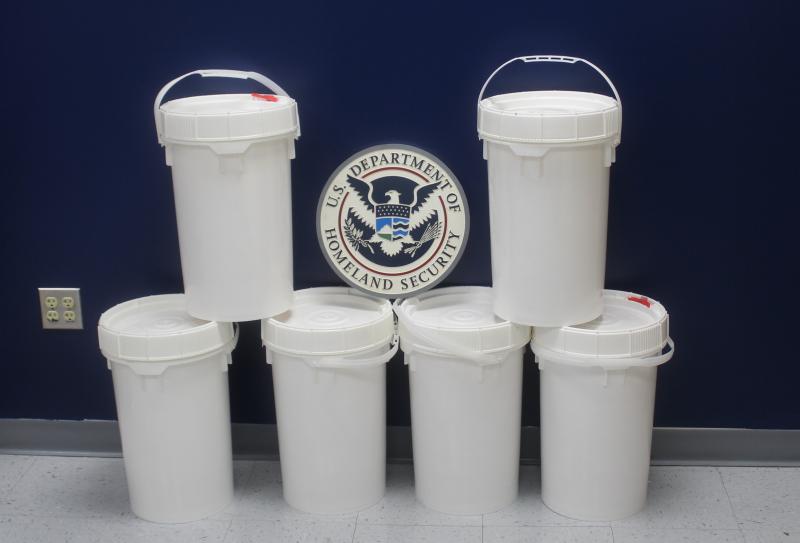 Buckets containing 149 pounds of methamphetamine seized by CBP officers at Colombia-Solidarity Bridge.