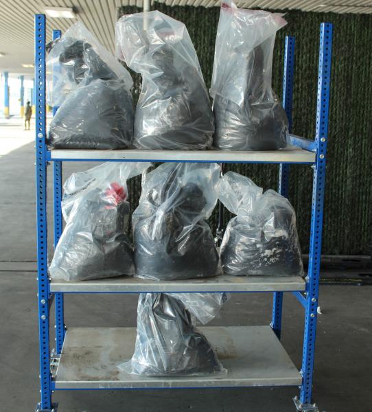 Bags containing more than 179 pounds of methamphetamine seized by  CBP officers at World Trade Bridge