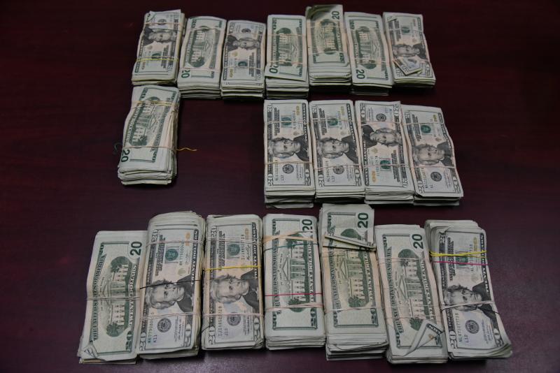 Stacks containing $91,116 in unreported currency seized by CBP officers at Juarez-Lincoln Bridge