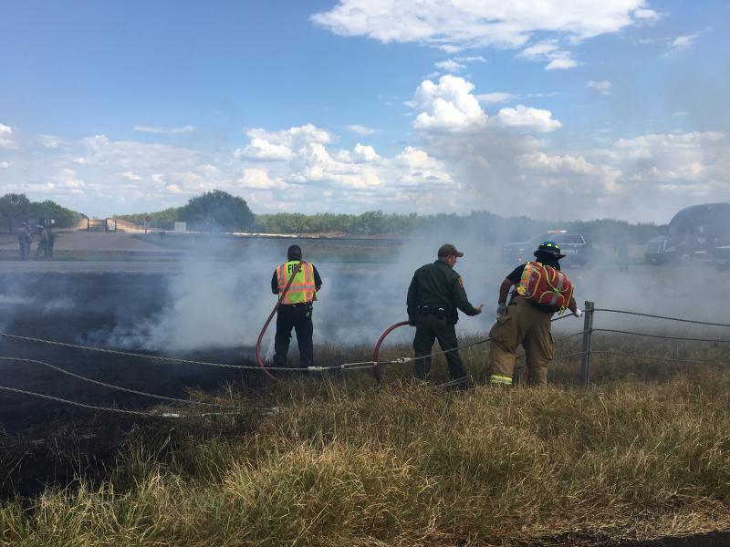 Laredo Sector Border Patrol agents assigned to Cotulla Station assisted first responders inextinguishing a grass fire started from a vehicle accident on Interstate 35