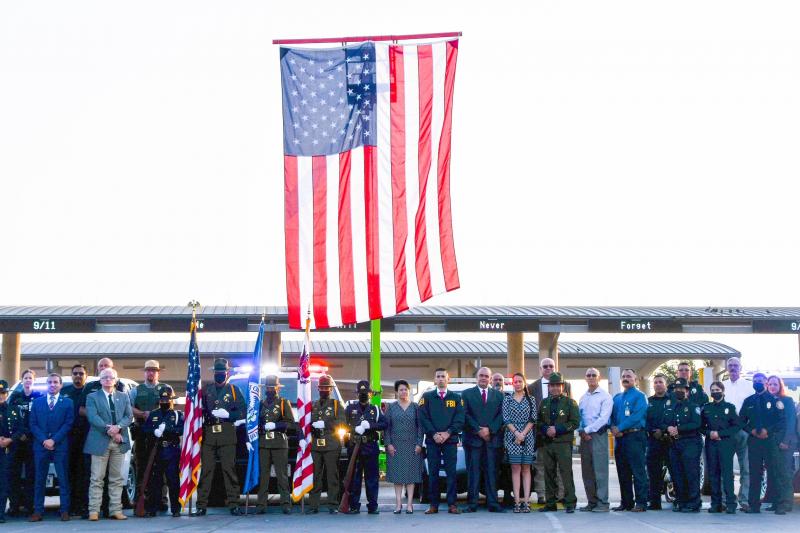 CBP officers, together with other federal, state and local law enforcement partners and stakeholders stand in formation during the 9/11 20th memorial ceremony held at Del Rio Port of Entry