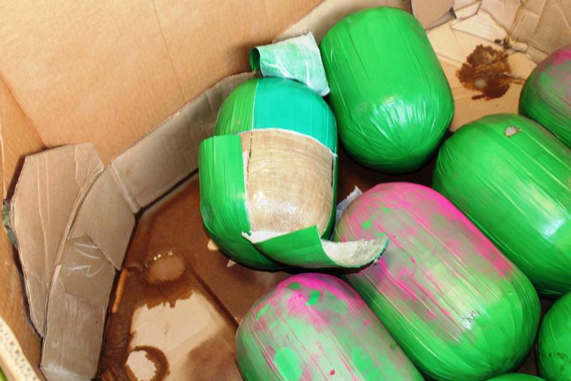 Packages shaped like watermelons containing 3,000 pounds of marijuana seized by CBP officers at Pharr International Bridge