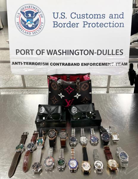 U.S. Customs and Border Protection officers seized more than $250,000 in counterfeit designer brand wrist watches, sun glasses and a handbag on March 29, 2022 from a traveler who arrived at Washington Dulles International Airport from Dubai, U.A.E.