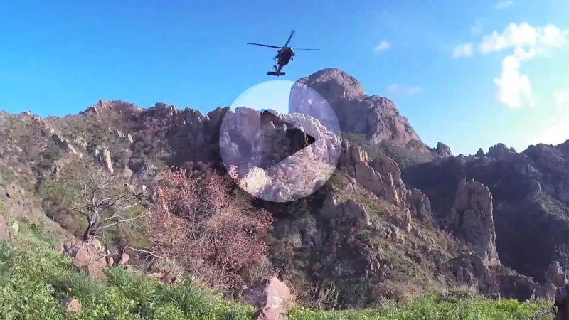 Tucson Sector agents & Tucson Air Branch personnel worked together to rescue a stranded migrant from the Baboquivari Peak personnel 