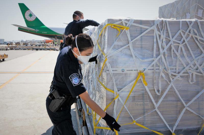 CBP officers inspect shipments