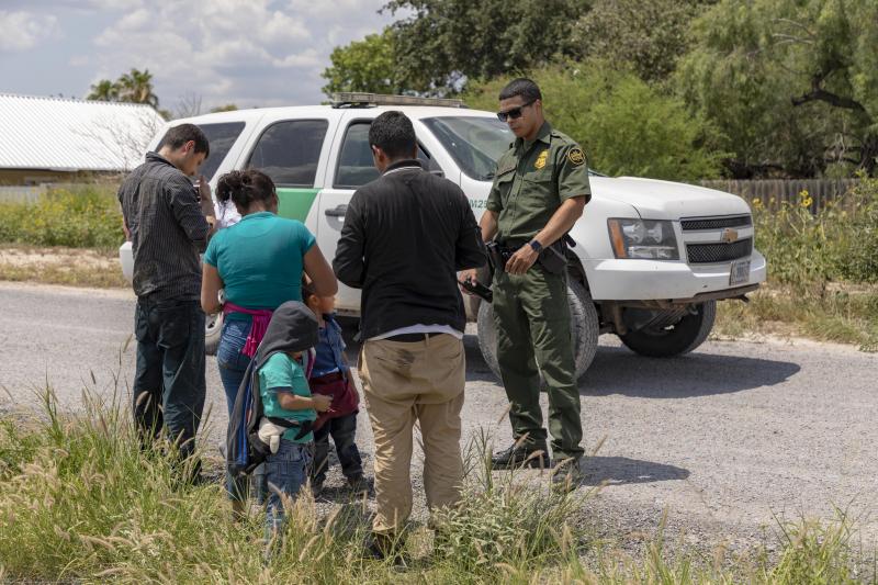 Illegal aliens apprehended by a Border Patrol agent