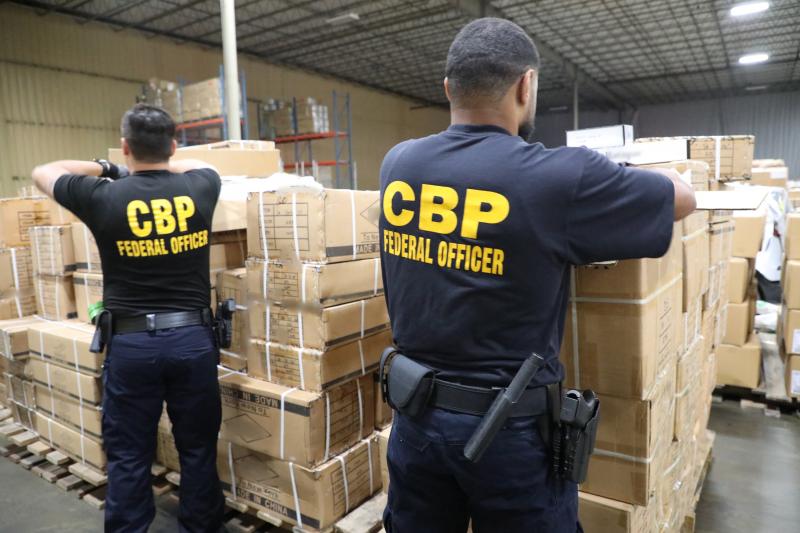 CBP personnel at the Port of New York/Newark inspect a shipment of Chinese hair products suspected to have been made with forced labor