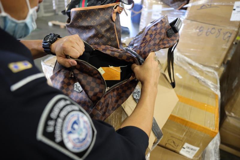 In November 2020, CBP Officers in Dallas intercepted a shipment of counterfeit footwear, handbags, and textiles worth over $9.3 million dollars.